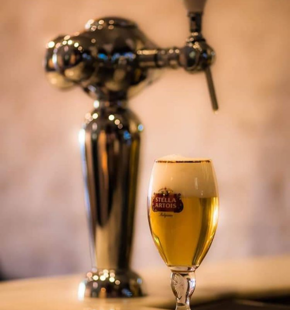 cerveza stella tirada