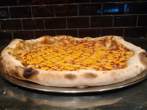 Imagen de una pizza de cheddar