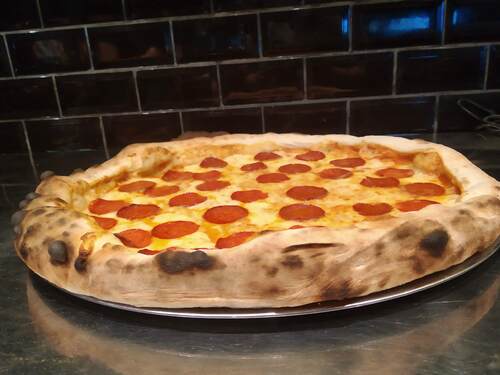 Imagen de una pizza de pepperoni